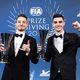 2021 Nations Cup champions Valerio Gallo (left) and Coque López hold their Manufacturer Series trophies at the FIA Prize-Giving Ceremony in December.